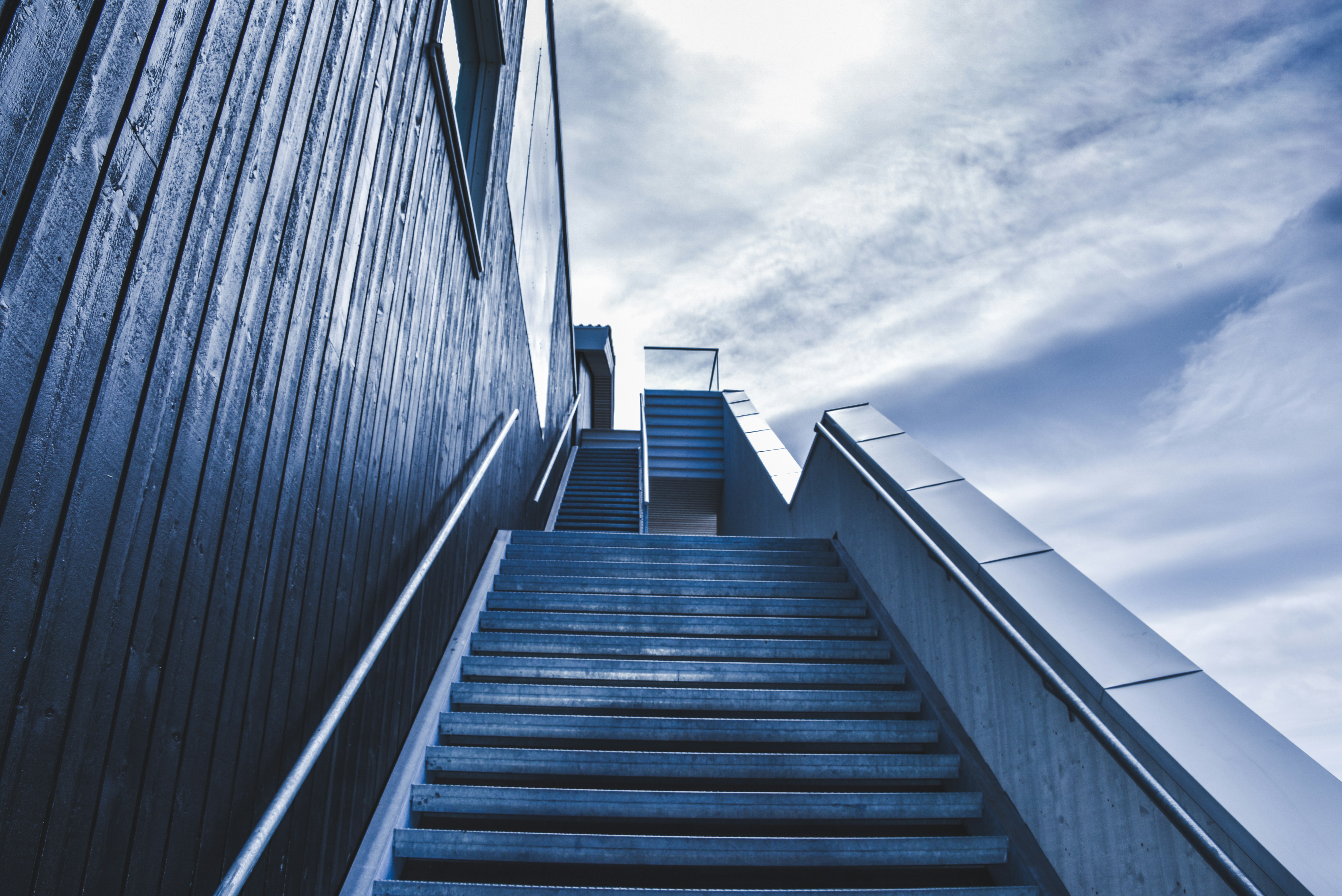 Senior Developer Career Path - photo of staircase under blue sky during daytime