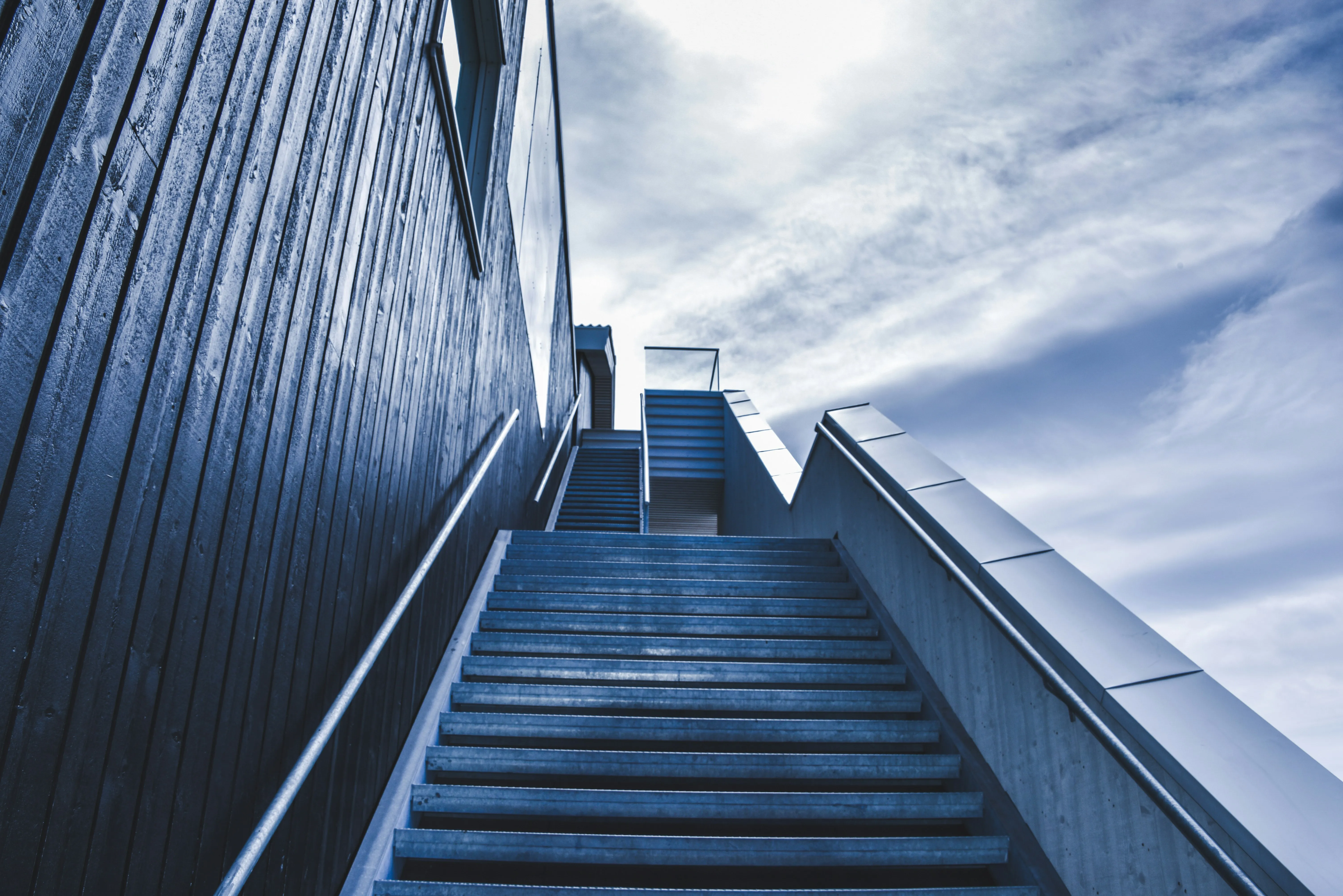 Senior Developer Career Path - photo of staircase under blue sky during daytime